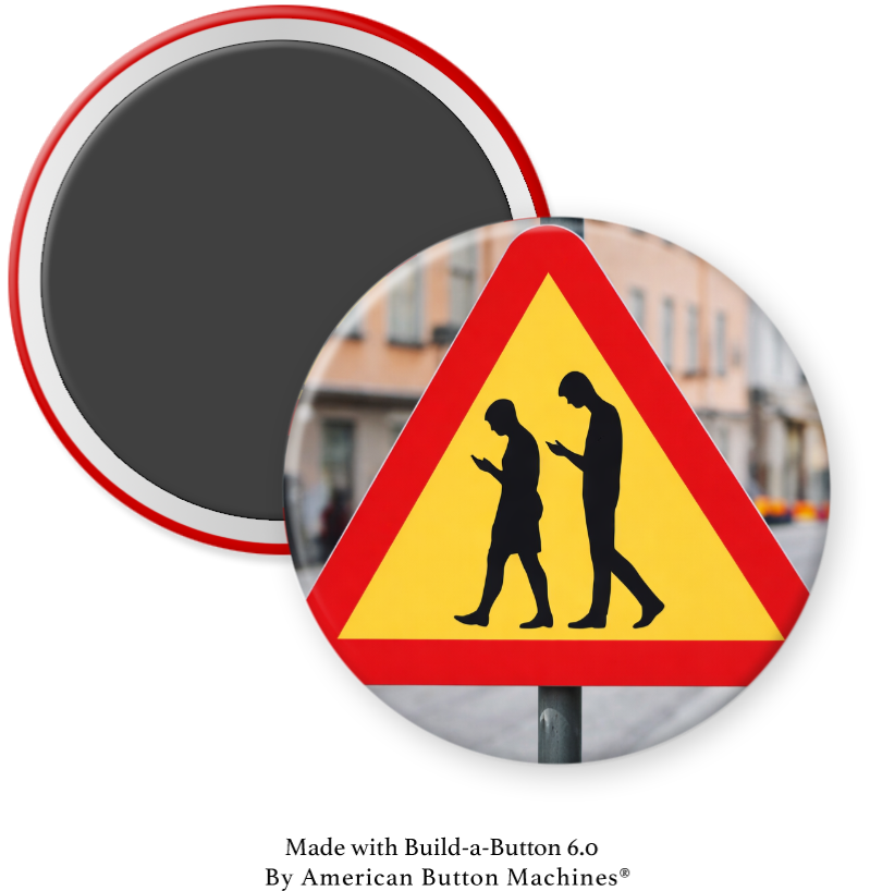 Magnet featuring "Yield to Distracted Walking" message from Magnets and Memories on a refrigerator door.
