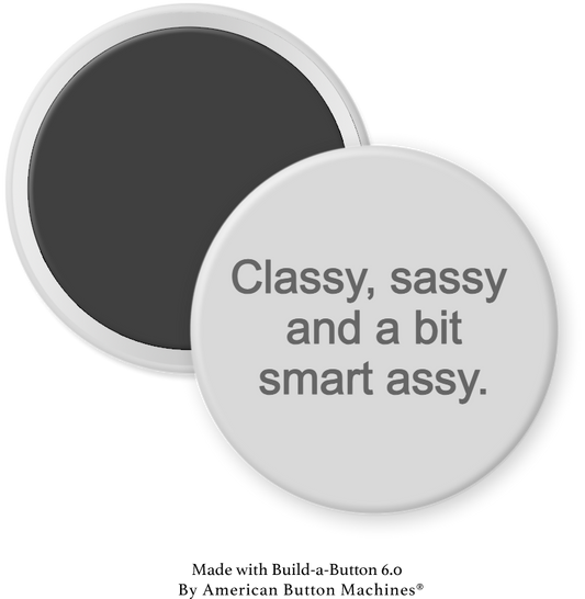 Refrigerator magnet with "Classy, Sassy and a Bit Smart Assy" quote from Magnets and Memories on a metal fridge surface.
