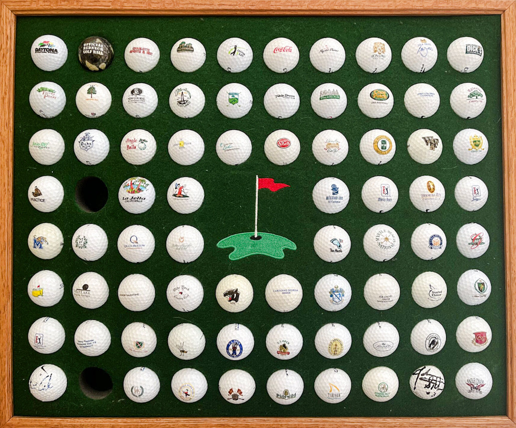 Golf lovers magnet board by Magnets and Memories featuring colorful golf-themed refrigerator magnets on a white background.