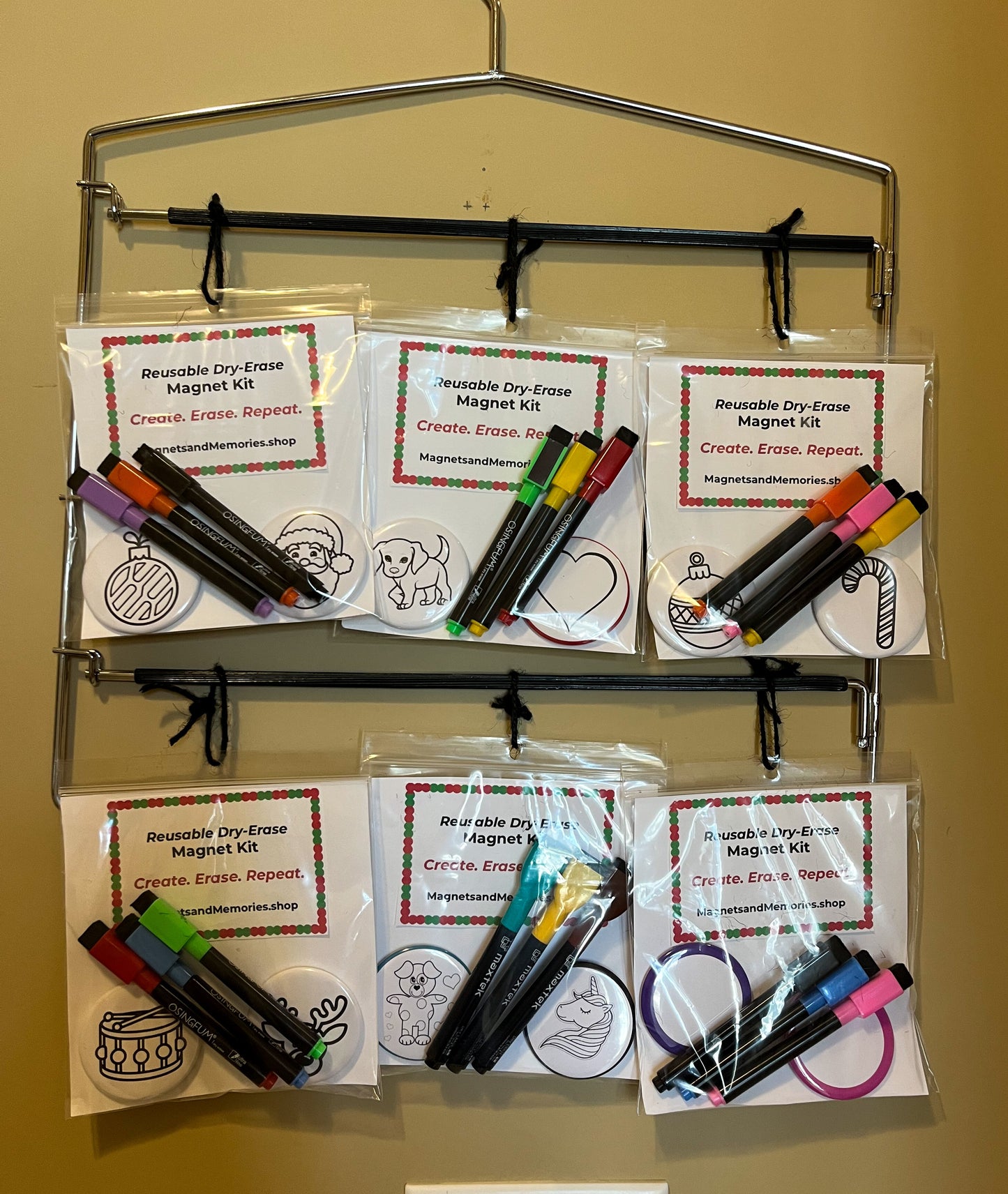 Reusable dry-erase magnet kit for kids featuring colorful refrigerator magnets and a dry-erase surface for creative play.