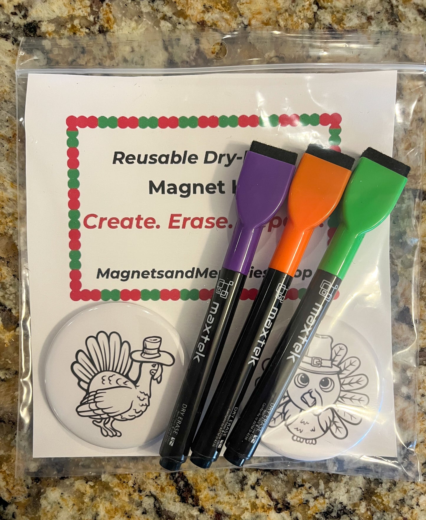 Reusable dry-erase magnet kit for kids featuring colorful refrigerator magnets for creative play and easy writing.